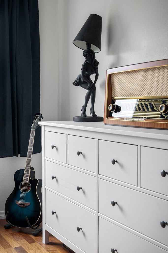 vintage radio on a white cupboard